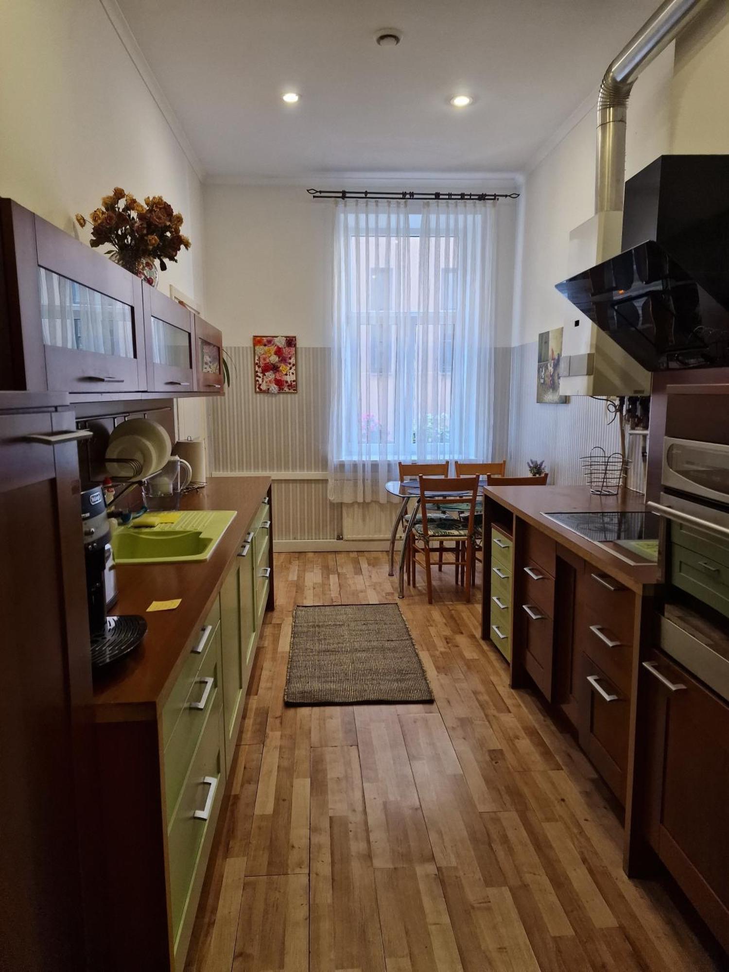 District, тихий центр города, всё под боком, удобно 公寓